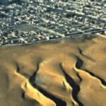 صورة فضائية تظهر كثبانا رملية تزحف على أطراف مدينة نواكشوط